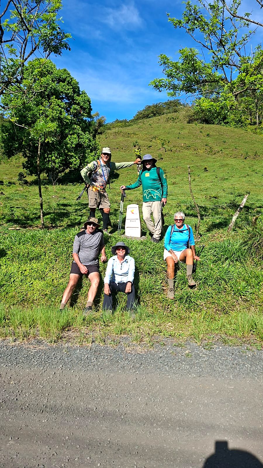 Hikers on a hillside path