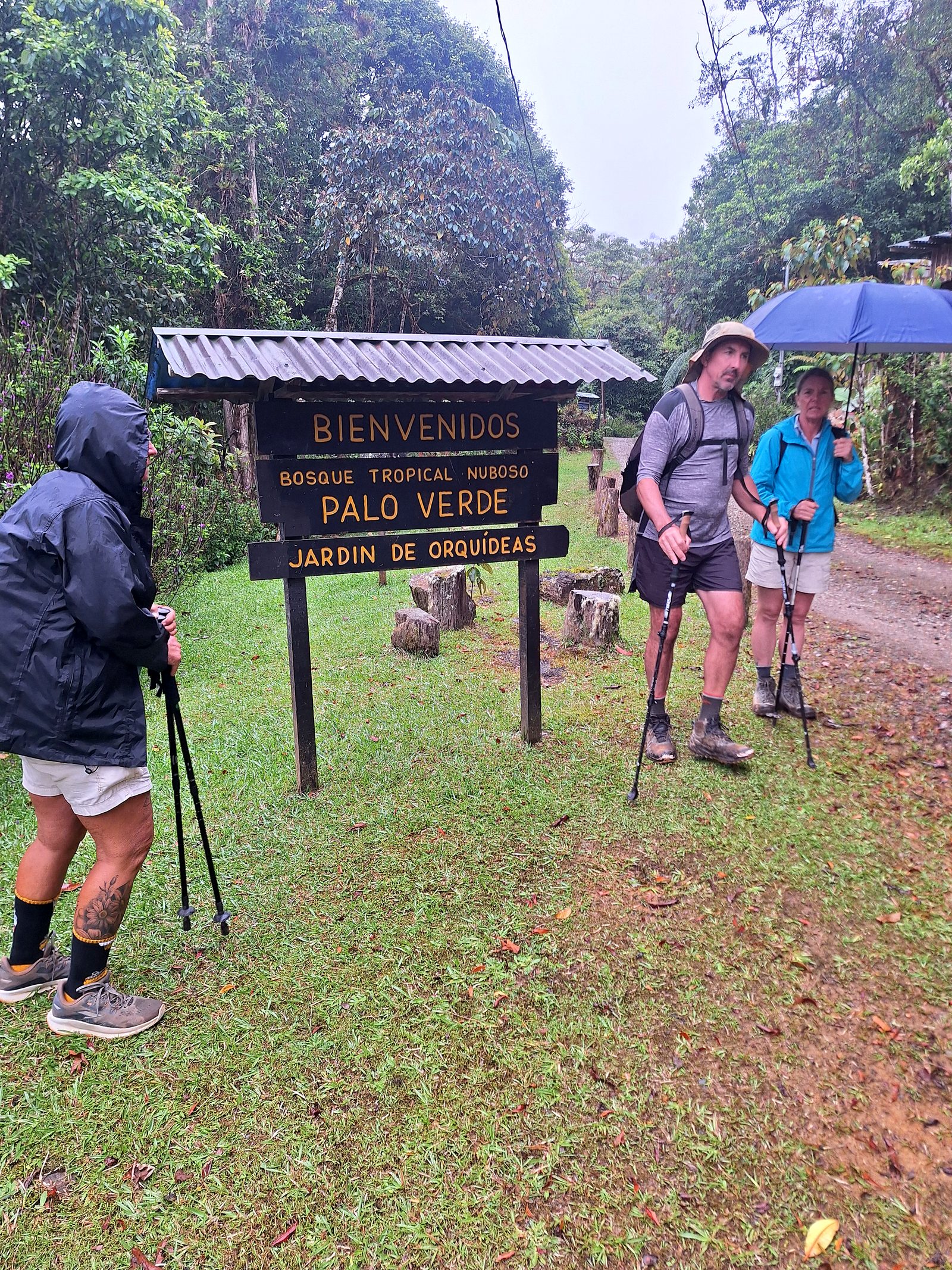 Hikers at a trail sign on the Pacific slope, Day 11