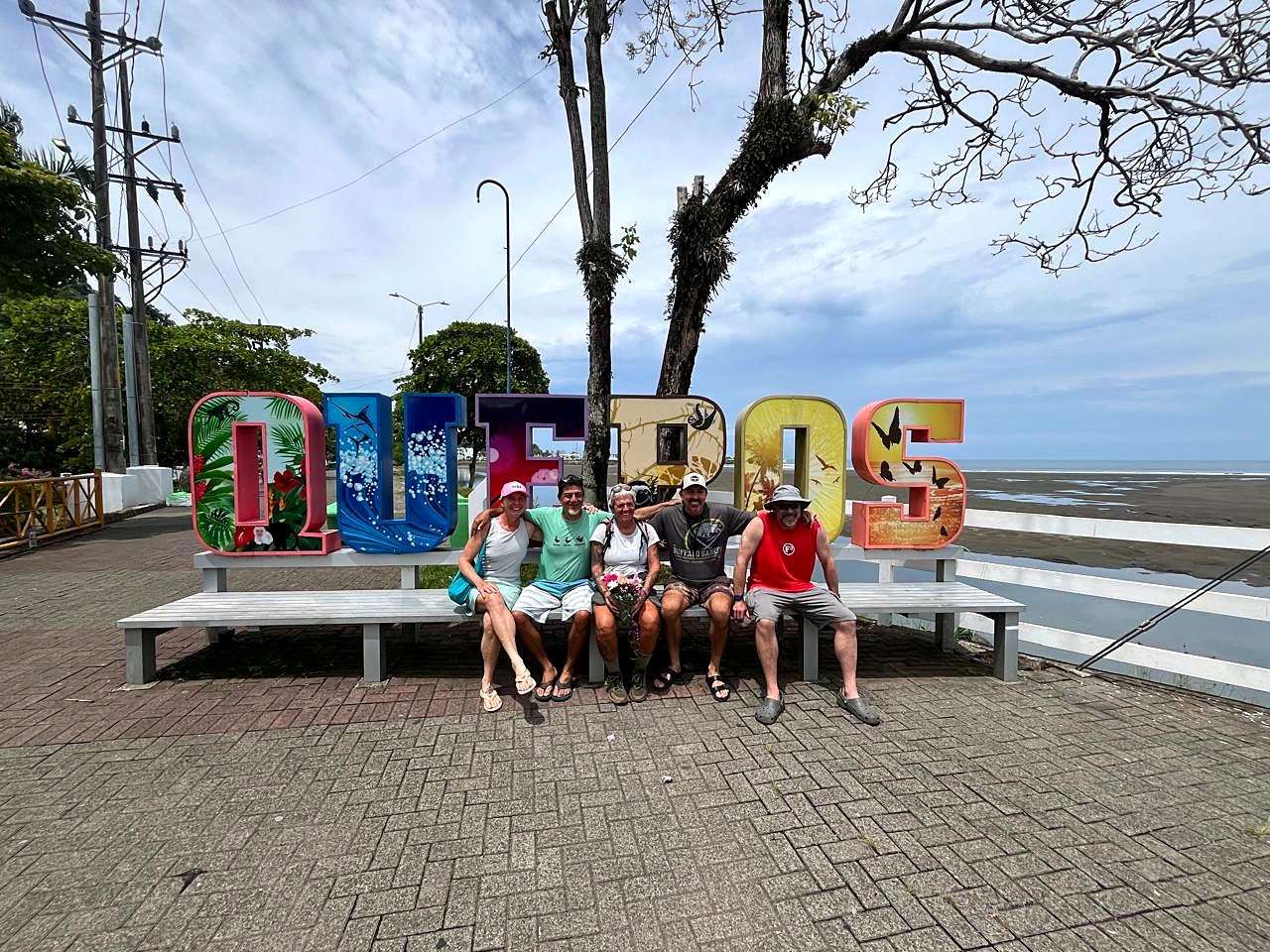 The group at the Quepos sign, the end of the trek
