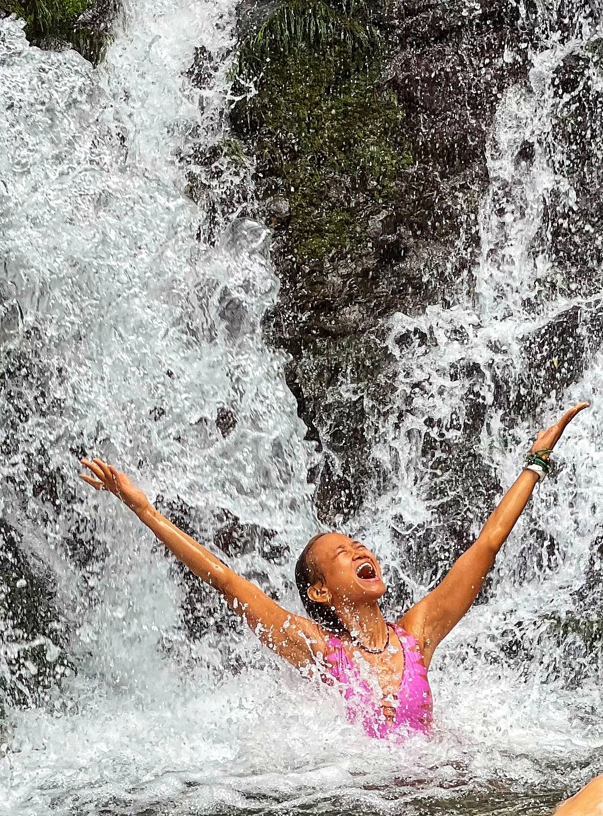 A guest under the waterfall