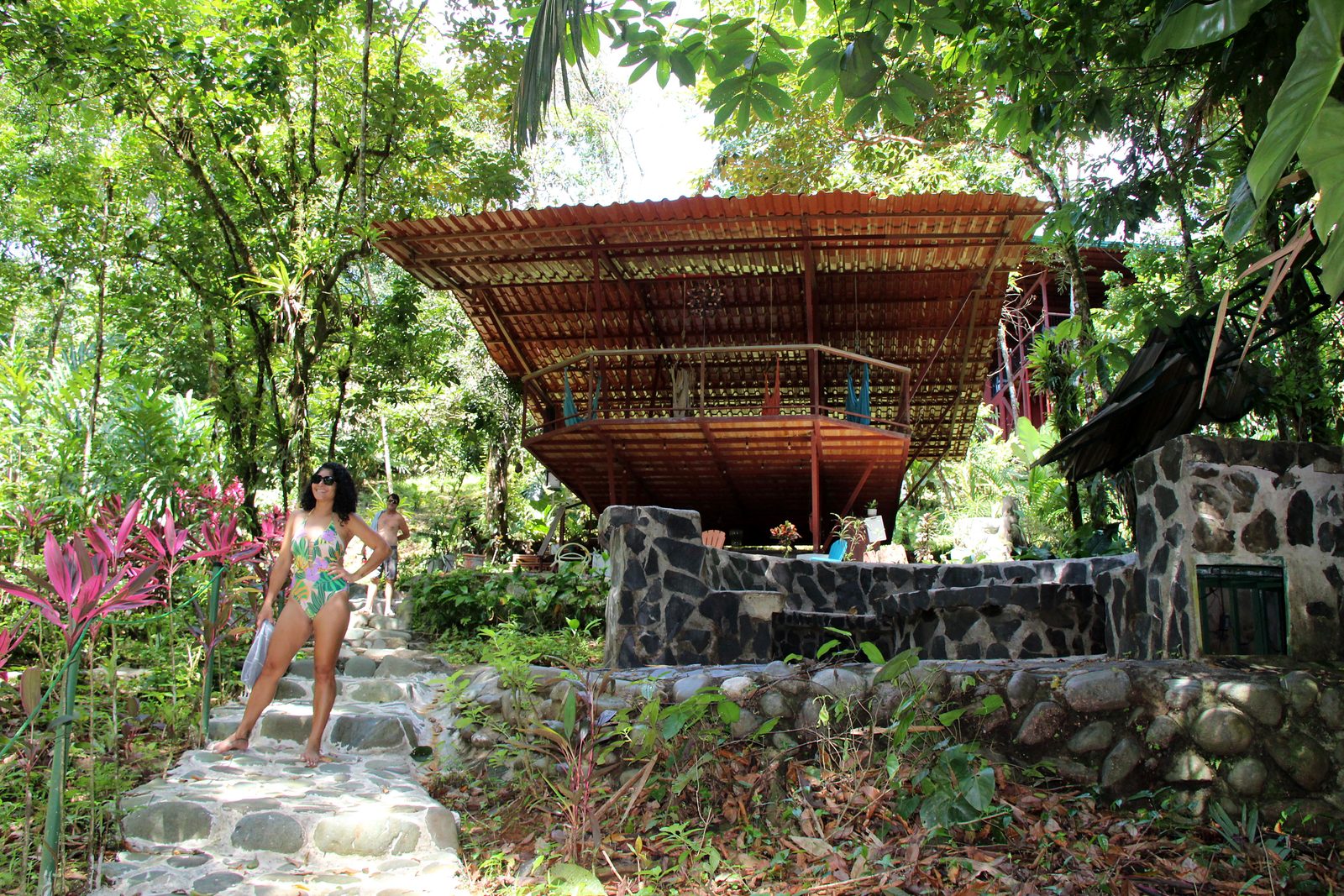 The rancho on its stone base, at the top of the steps from the garden