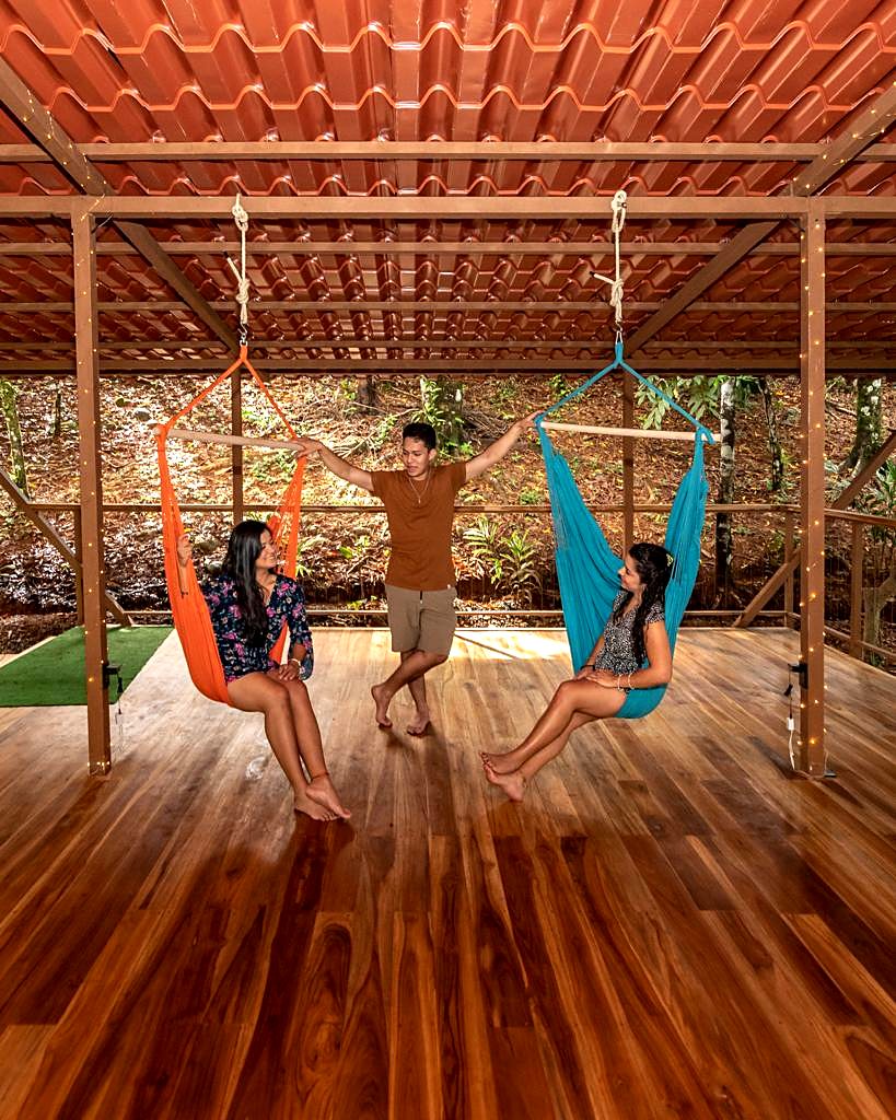 Three guests with hammocks on the rancho deck