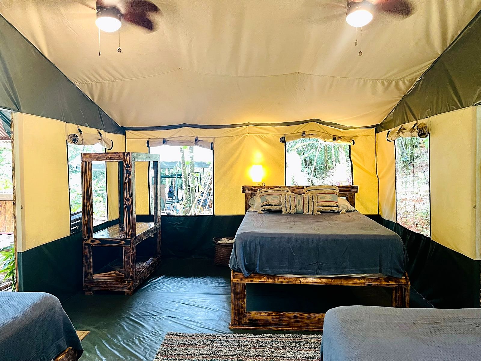 The large tent with a double bed and two singles