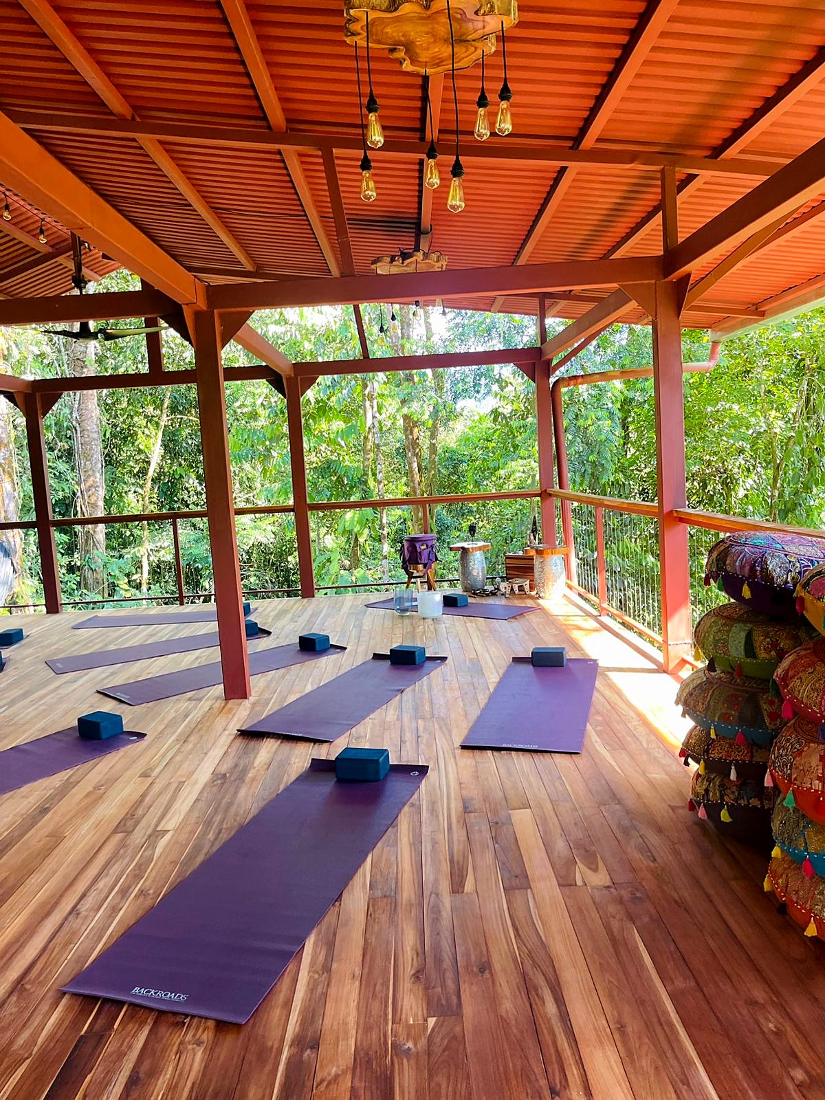 Yoga mats laid out on the wooden platform